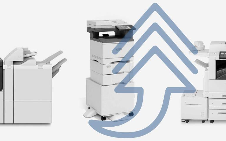 Different Xerox copiers with arrow graphic pointing up