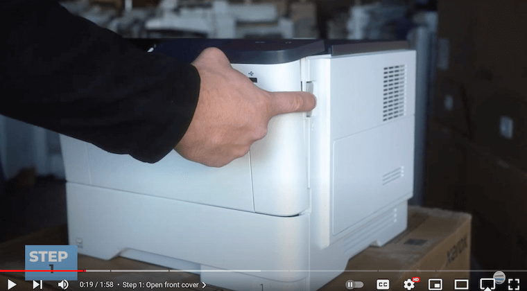 Printer technician opens the front cover on the Xerox B410/B415